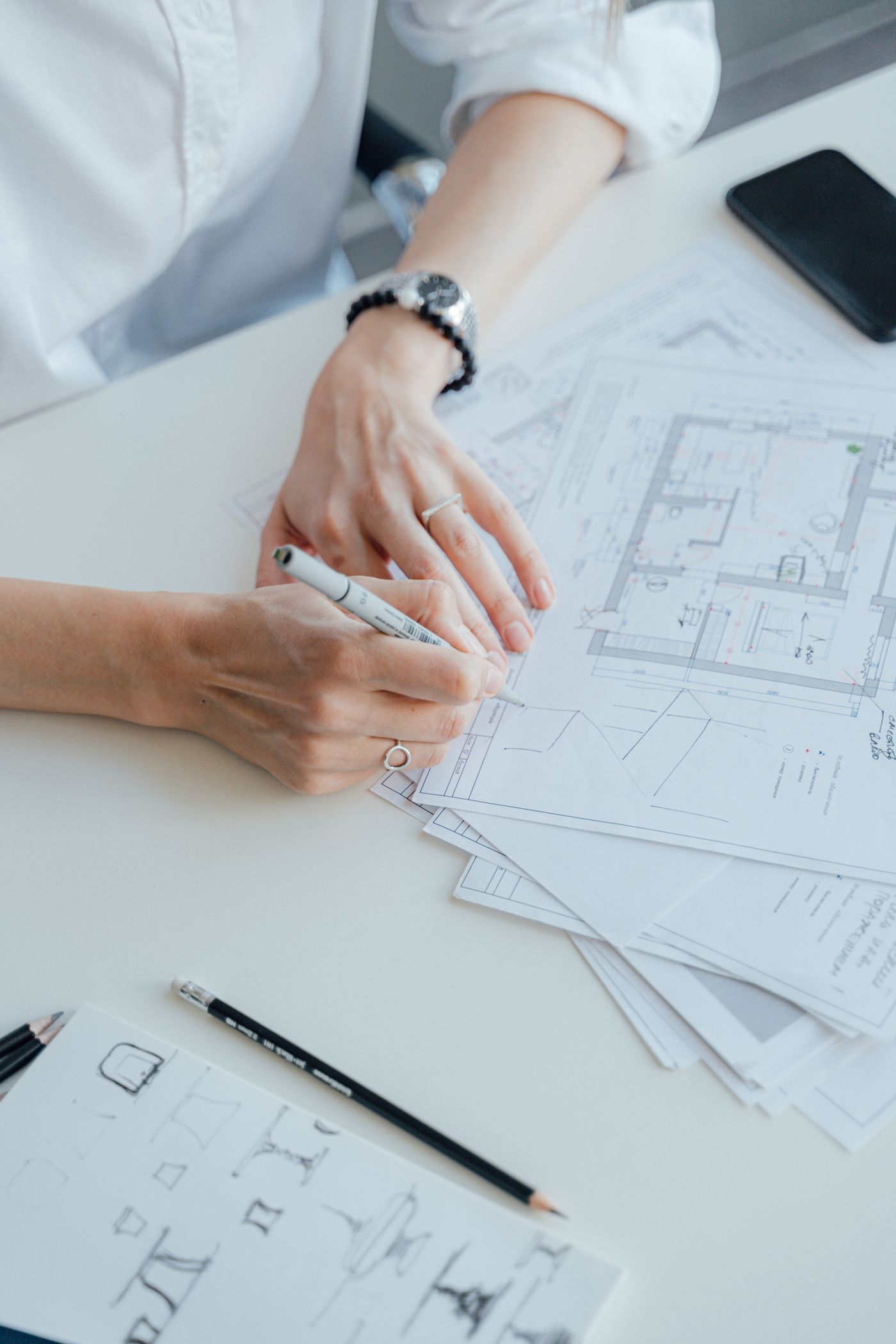 Quantity surveyor assessing property floor plans for a tax depreciation schedule